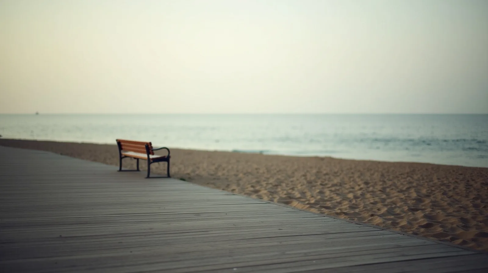 A quiet empty beach boardwalk at dawn